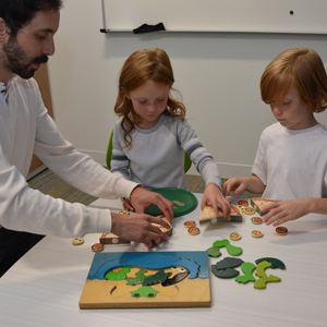 Student therapist playing with children