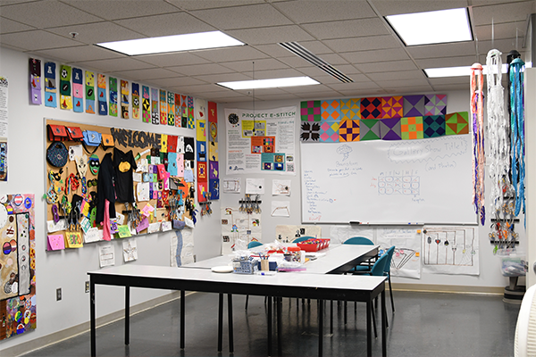 The CHAOS Learning Lab, with tables and art supplies set up for art camp
