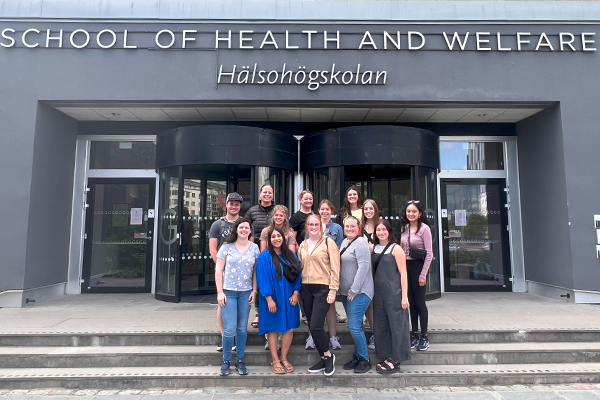 USU students stand in front of the School of Health and Welfare at Jönköping University in Sweden