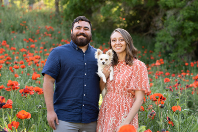 Justin Bassett with wife and dog