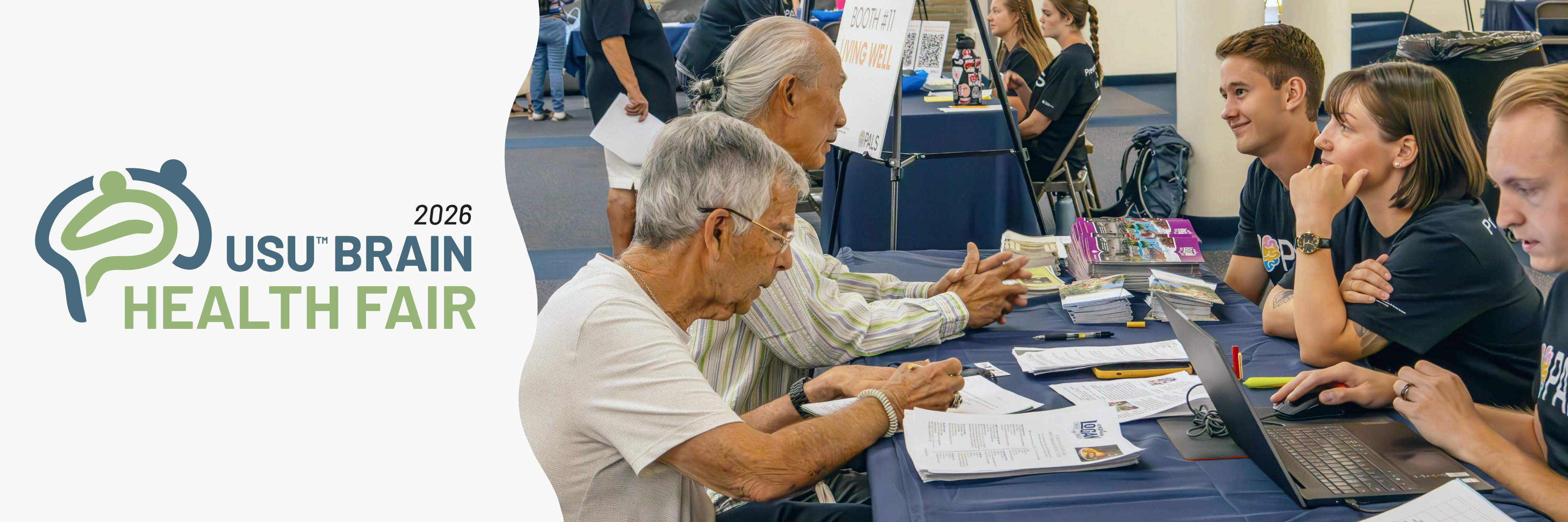Photo from previous brain health fair showing people interacting with each other.