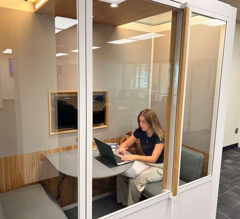 Student working inside a pod in YETC.